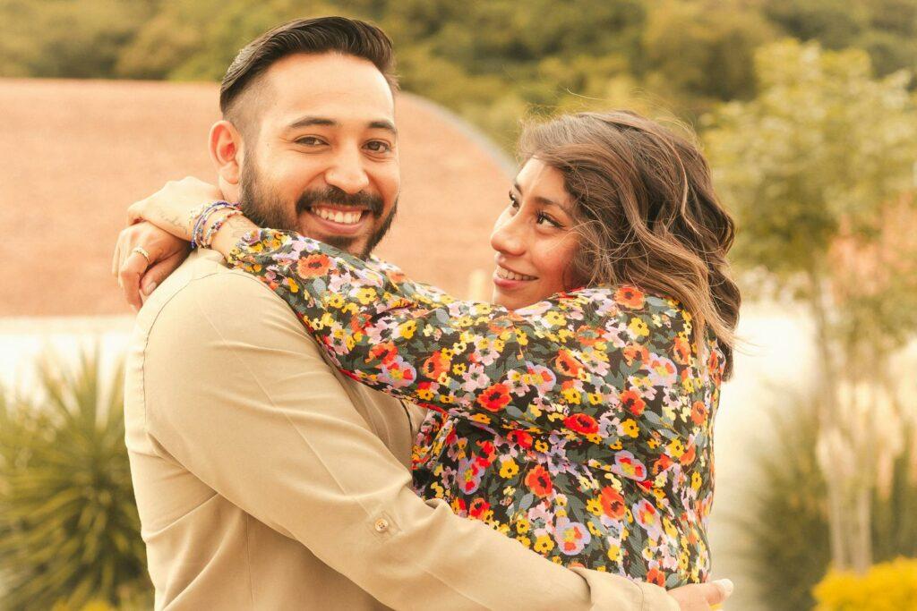 Couple Embracing and Smiling
